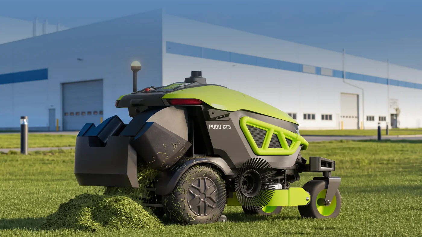 The collection compartment opens to discharge grass clippings.